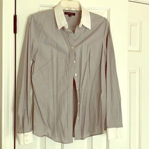 Grey fitted blouse with white collar and wrists